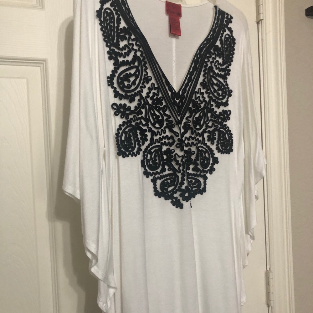 White butterfly sleeved blouse